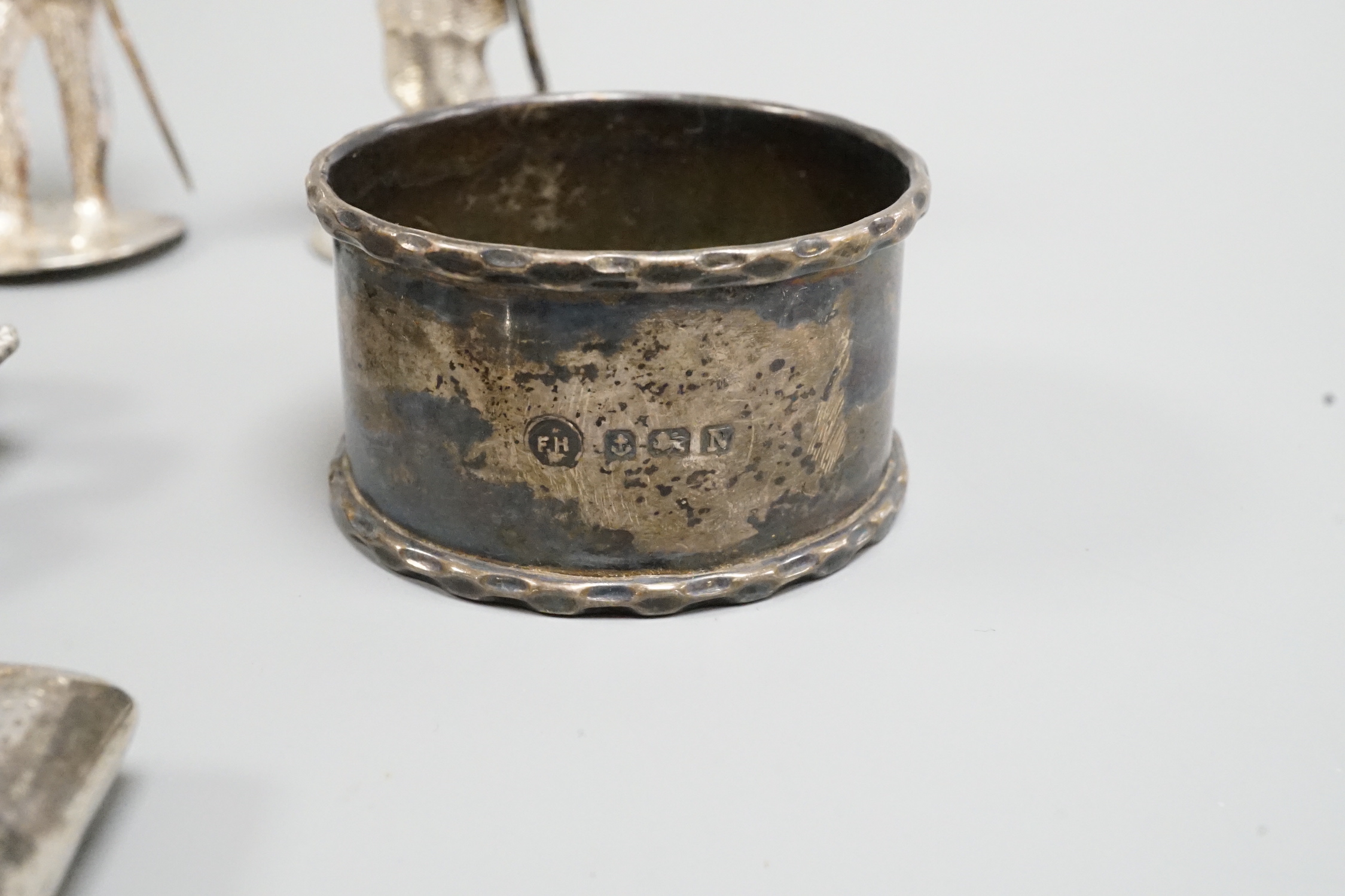 A continental 800 standard white metal miniature wager cup, 64mm, a modern silver belt buckle, silver vesta case and three other items.